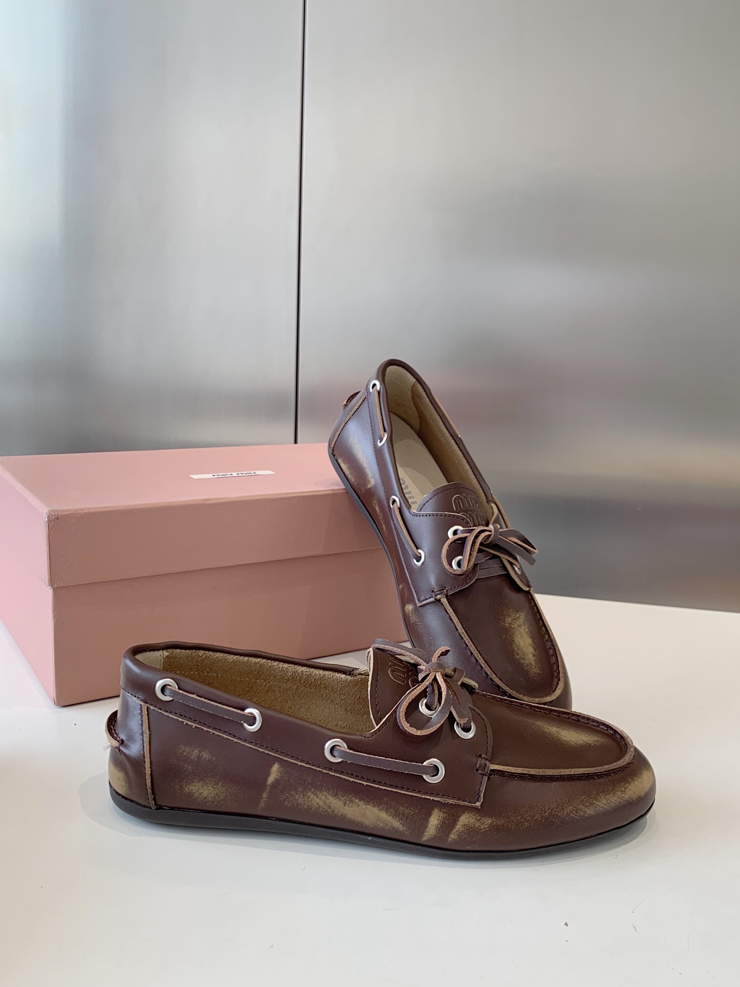 Bagsaaa Miu Miu Unlined bleached leather boat shoes brown
