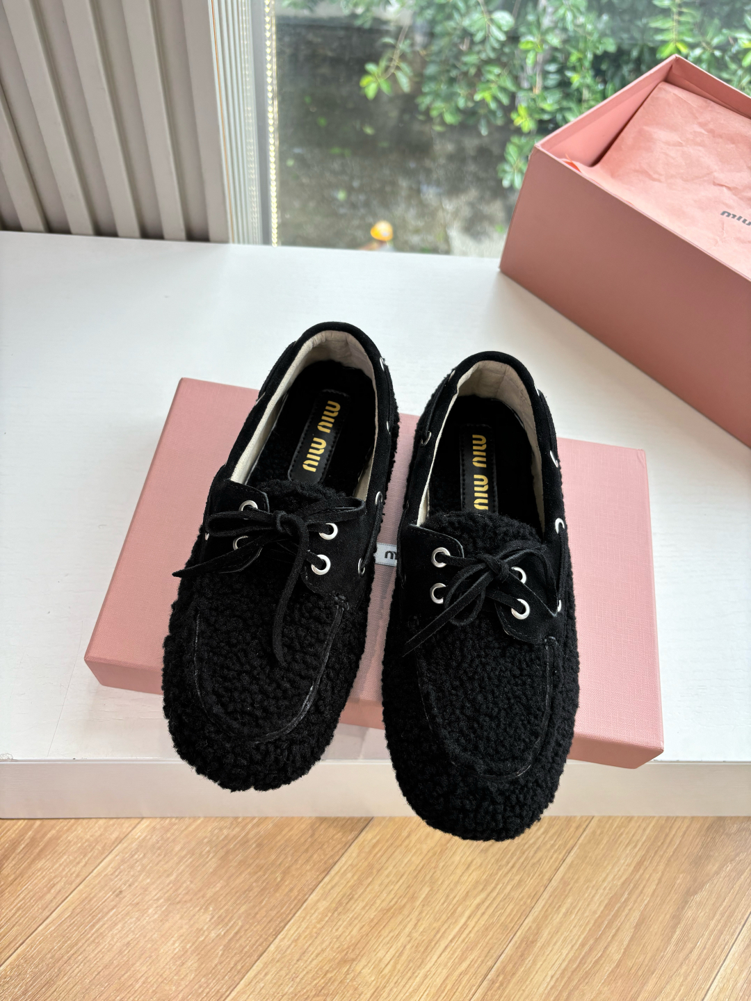 Bagsaaa Miu Miu shearling loafers black