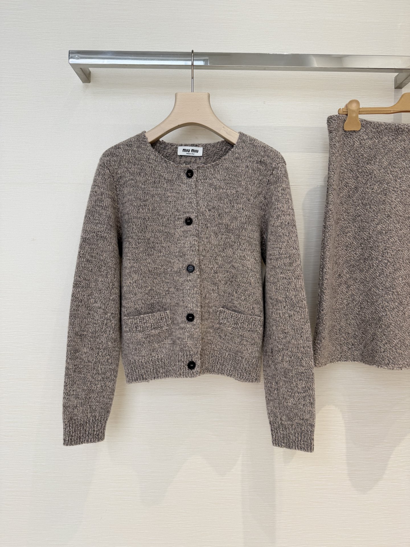 Bagsaaa Miu Miu wool cardigan with a crew neck and pockets